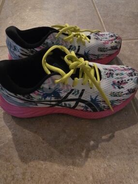Asics Running Shoes with Pink Sole and Yellow Laces.